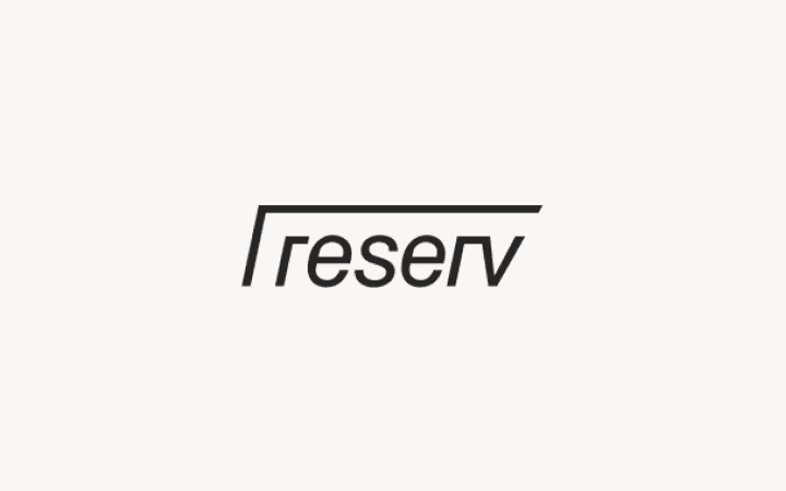 Reserv logo in minimalist text on a light background