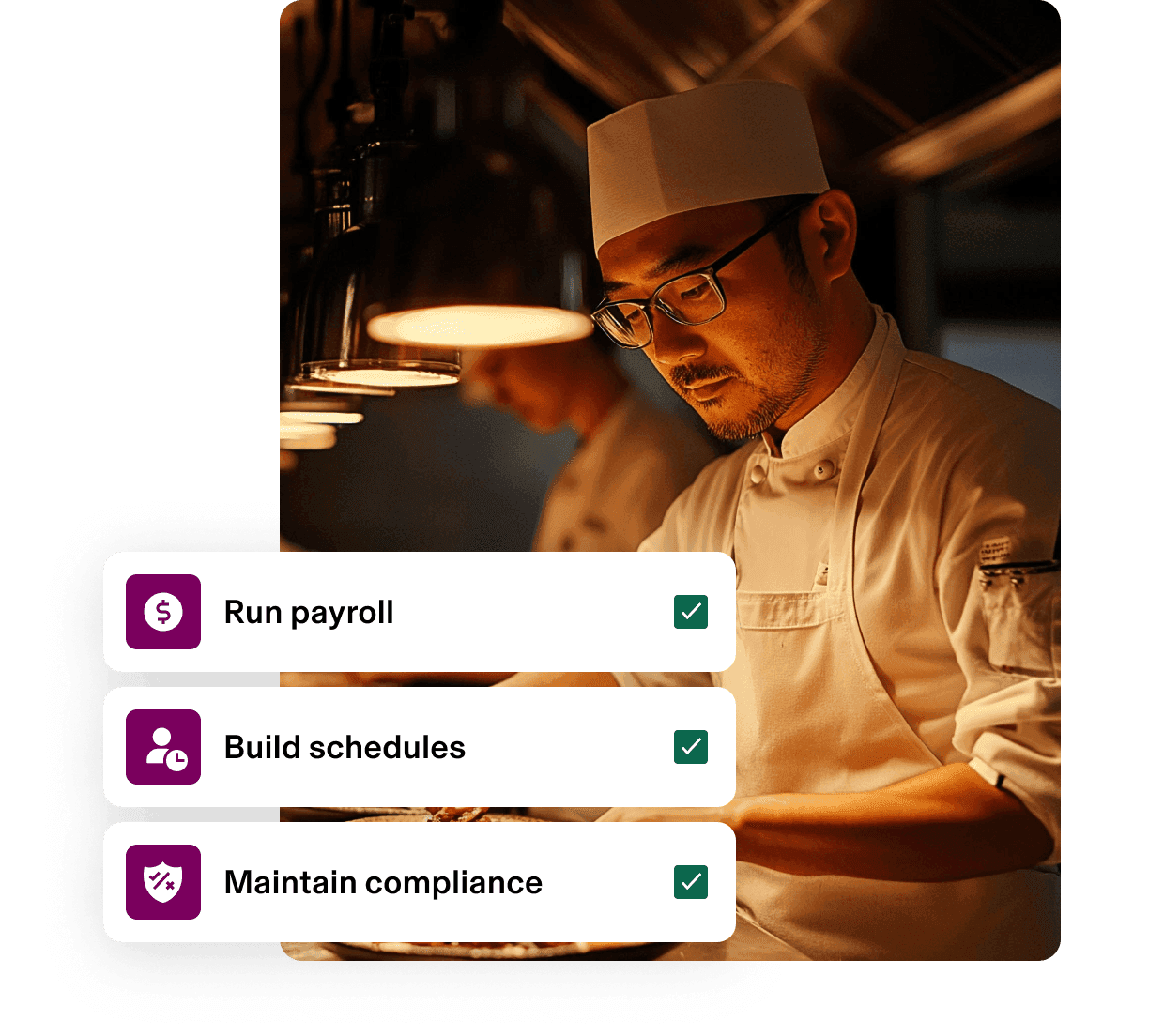 Chef working in a dim kitchen with completed payroll, scheduling, and compliance tasks.