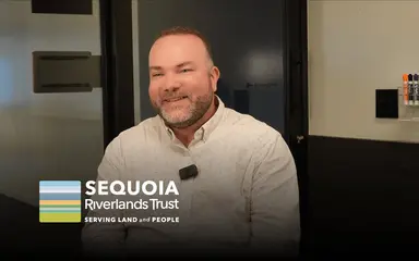 Interview frame showing a person beside “Sequoia Riverlands Trust” text.