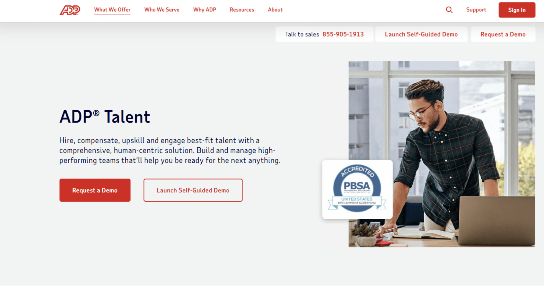 ADP Talent page with a person leaning over a desk beside product text.