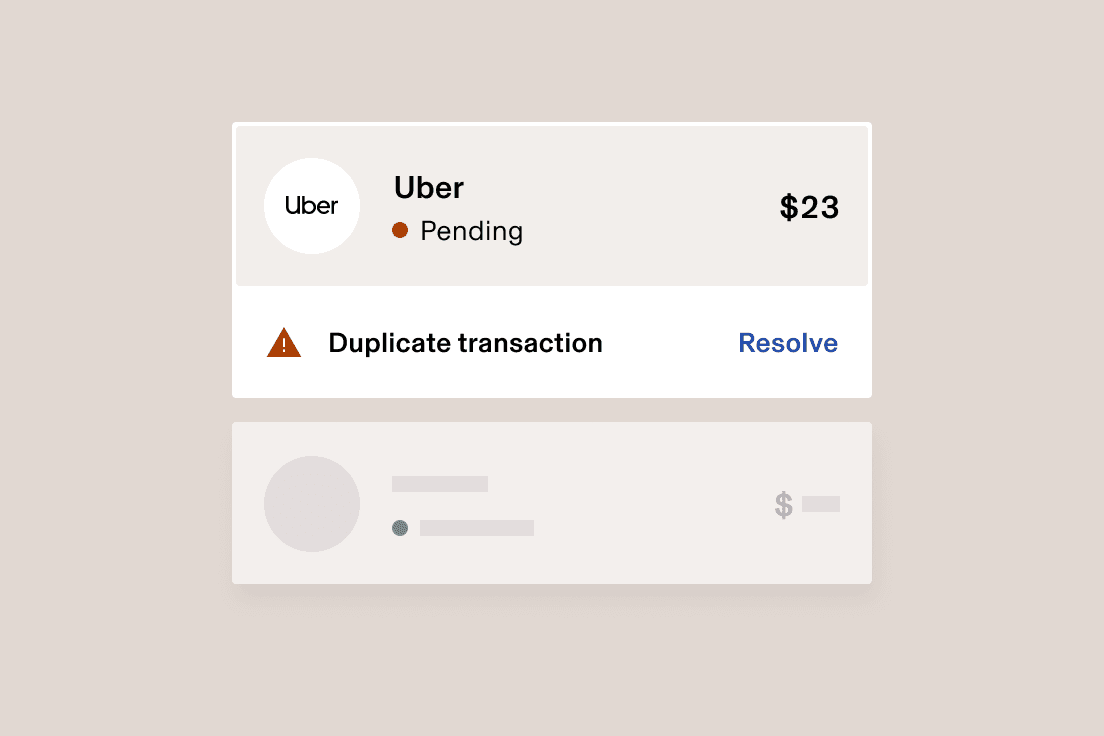 Uber payment interface showing a pending $23 transaction with a duplicate transaction warning and resolve option.
