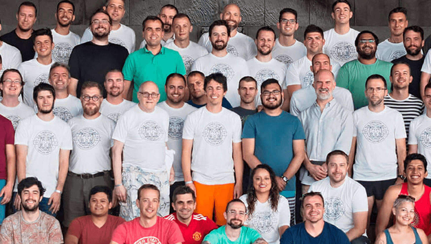 Large group, people, wearing matching shirts